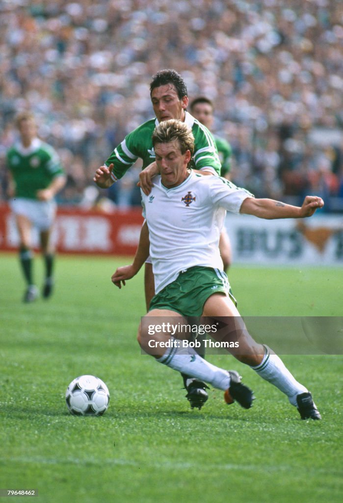 BT Sport, Football, pic: 11th October 1989, World Cup Qualifier in Dublin, Republic of Ireland 3 v Northern Ireland 0, Northern Ireland's Alan McDonald tries to hold off a challenge from Republic of Ireland's Tony Cascarino
