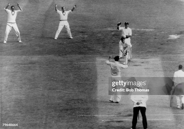 Series, Melbourne, 3rd Test Match, Australia v England, Australia batsman Richie Benaud is caught by Godfrey Evans off the bowling of Alec Bedser for...