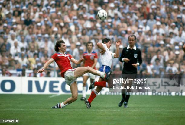 16th June 1982, 1982 World Cup Finals, Bilbao, England 3 v France 1, England's Bryan Robson tackles France's Alain Giresse