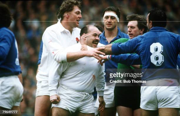Sport, Rugby Union, pic: 21st February 1987, 5 Nations Championship, England 15, v France 19, England prop Gareth Chilcott is held back by team-mate...