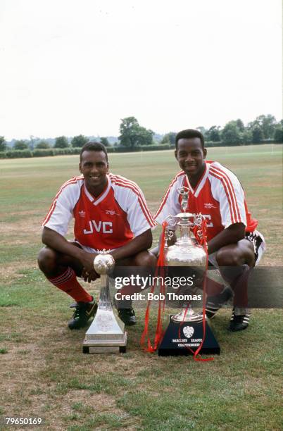 Arsenal's David Rocastle, left, and Michael Thomas with the First Division Championship trophies, Michael Thomas clinched the Championship for...