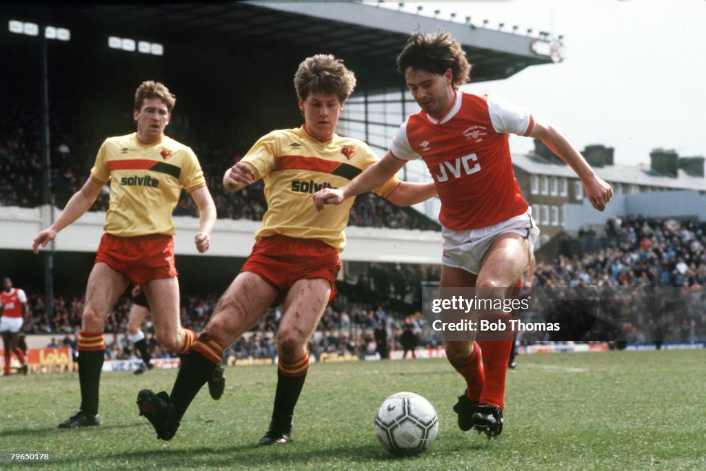 BT Sport, Football, pic: circa 1987, Division 1, Arsenal v Watford at Highbury, Arsenal's Charlie Nicholas, right, under pressure from Watford's Nigel Gibbs