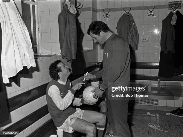 Arsenal Manager Terry Neill with star player Liam Brady in the dressing room