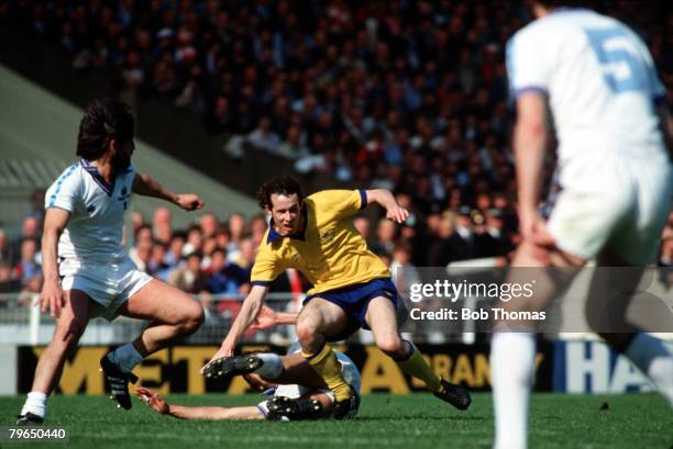 Sport, Football, FA Cup Final, Wembley, 10th May 1980, West Ham United 1 v Arsenal 0, Arsenal's Liam Brady is tackled by West Ham's Trevor Brooking...