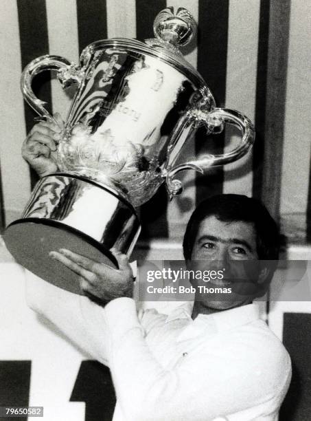 Spain's Severiano Ballesteros, born 1957,holds aloft the 1981 World Matchplay Championship trophy after his victory at Wentworth, Severiano...