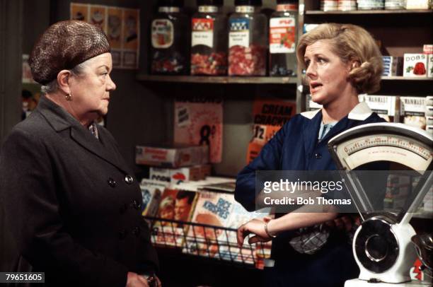 England, Circa 1970, Actress Irene Sutcliffe who plays the role of Maggie Clegg is pictured with Violet Carson as Ena Sharples in a scene from the...
