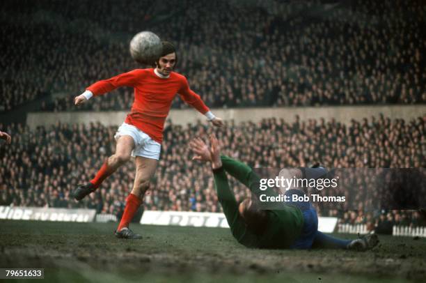 Circa 1968, Manchester United's George Best scoring against Sheffield Wednesday