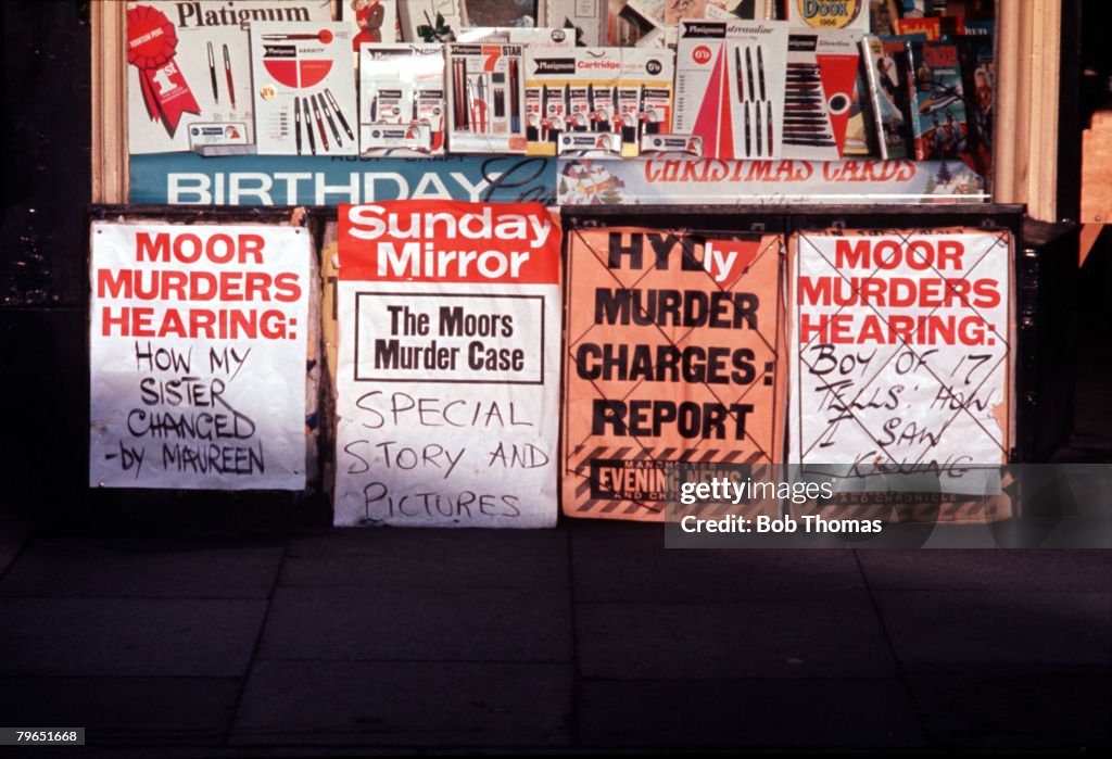 England, Circa 1965, Newspaper headlines telling of the Moors Murders court hearings are pictured outside a newspaper shop during the trial of Myra Hindley and Ian Brady