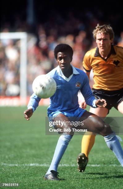 Circa 1980, Division One, Manchester City's Dave Bennett is challenged by Wolverhampton Wanders' Derek Parkin