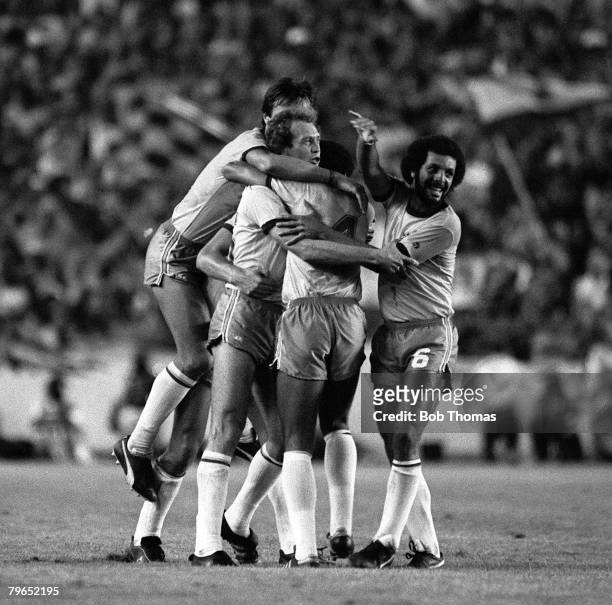 Football, 1982 World Cup Finals, Seville, Spain, 18th June 1982, Brazil 4 v Scotland 1, Brazil's Paulo Falcao is mobbed by jubilant teammates as they...
