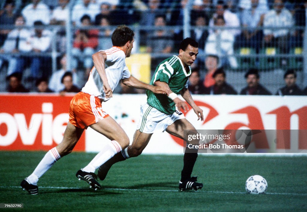 1990 World Cup Finals, Palermo, Italy, 12th June, 1990, Holland 1 v Egypt 1, Egypt's Hossam Hassan takes the ball past Holland's Graeme Rutjes