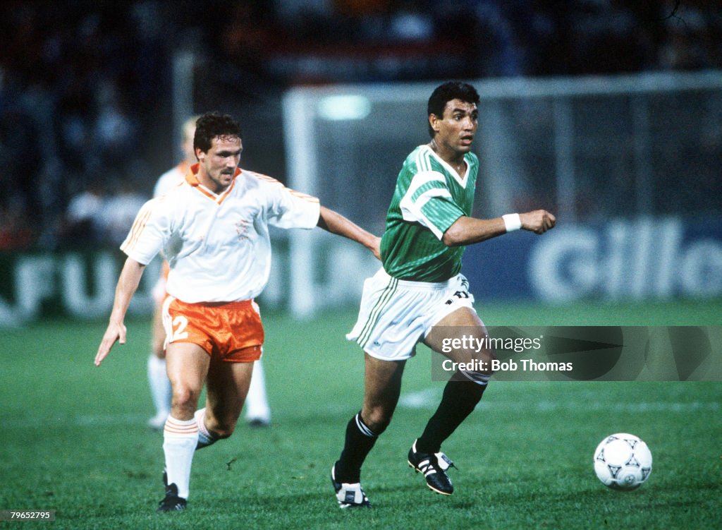 1990 World Cup Finals, Palermo, Italy, 12th June, 1990, Holland 1 v Egypt 1, Egypt's Abdel Hamid Gamal takes the ball past Holland's Barry Van Aerle