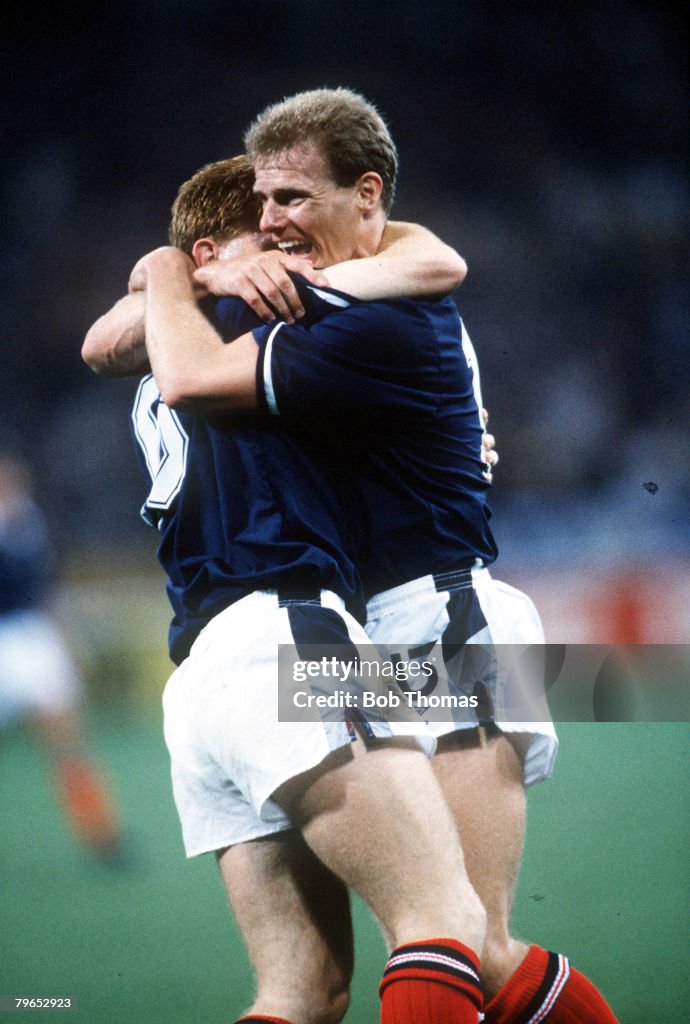 1990 World Cup Finals, Genoa, Italy, 16th June, 1990, Scotland 2 v Sweden 1, Scotland's Stuart McCall is congratulated by teammate Gordon Durie (right) after scoring his goal