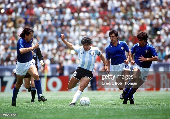 1986 World Cup Finals, Puebla, Mexico, 5th June, 1986, Italy 1 v Argentina 1,Argentina's Diego Maradona races between Italy's Antonio Di Gennaro and Fernando De Napoli 1986 World Cup Finals, Puebla, Mexico, 5th June, 1986, Italy 1 v Argentina 1,Argentina's Diego Maradona races between Italy's Antonio Di Gennaro and Fernando De Napoli
