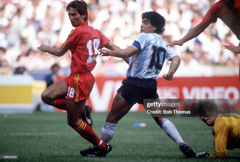 1986 World Cup Semi Final, Azteca Stadium, Mexico, 25th June, 1986, Argentina 2 v Belgium 0, Argentina's Diego Maradona beats Belgian defender Danny Veyt to score the first goal