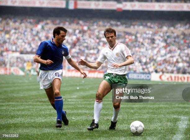 World Cup Finals, Azteca Stadium, Mexico, 31st May 1986, Italy 1 v Bulgaria 1, Italy's Gaetano Scirea moves in to challenge Bulgaria's Stoicho...
