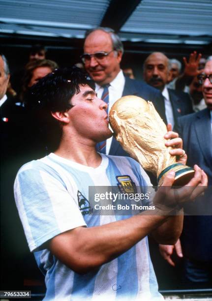 World Cup Final, Azteca Stadium, Mexico, 29th June Argentina 3 v West Germany 2, Argentina's Diego Maradona kisses the trophy after his team's win