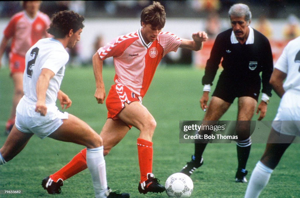 1986 World Cup Finals, Neza, Mexico, 8th June, 1986, Denmark 6 v Uruguay 1, Denmark's Michael Laudrup is marked closely by Uruguay's Nelson Guttierez