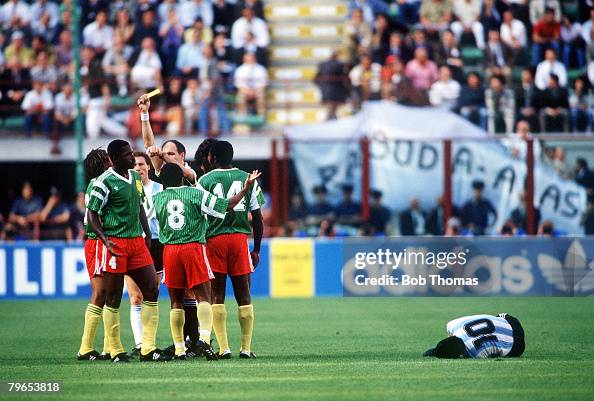 1990 World Cup Finals, Milan, Italy, 8th June, 1990, Opening Ceremony, Cameroon's Benjamin Massing is booked by the referee for a foul on Argentina's Diego Maradona 1990 World Cup Finals, Milan, Italy, 8th June, 1990, Opening Ceremony, Cameroon's Benjamin Massing is booked by the referee for a foul on Argentina's Diego Maradona