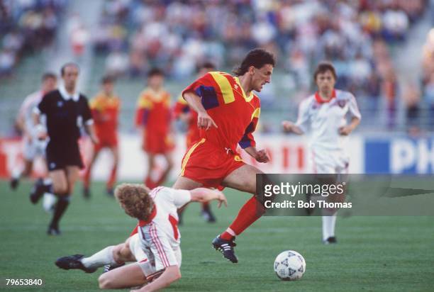 World Cup Finals, Bari, Italy, 9th June Romania 2 v USSR 0, Romania's Gheorghe Popescu takes the ball past USSR's Oleg Kuznetsov