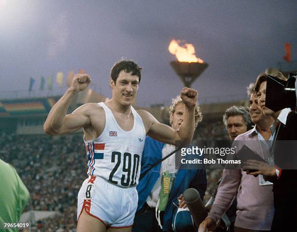 Scottish sprinter Allan Wells of Great Britain celebrates after winning the gold medal in the Men's 100 metres event at the 1980 Summer Olympics in...