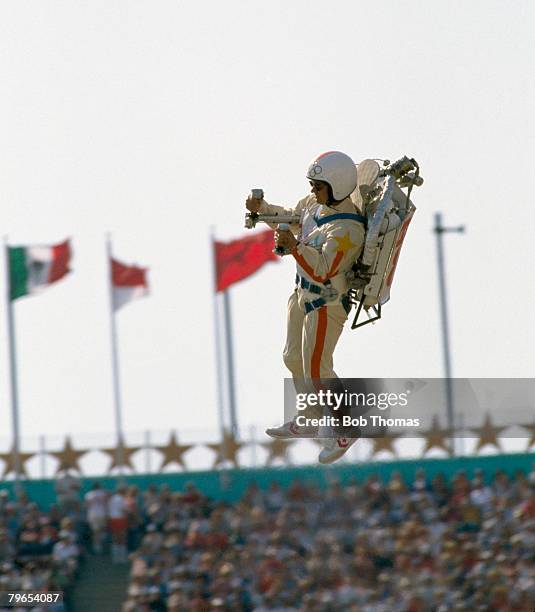 Bill Suitor wears a jet pack to propel himself into the Memorial Coliseum during the opening ceremony of the 1984 Summer Olympics in Los Angeles,...