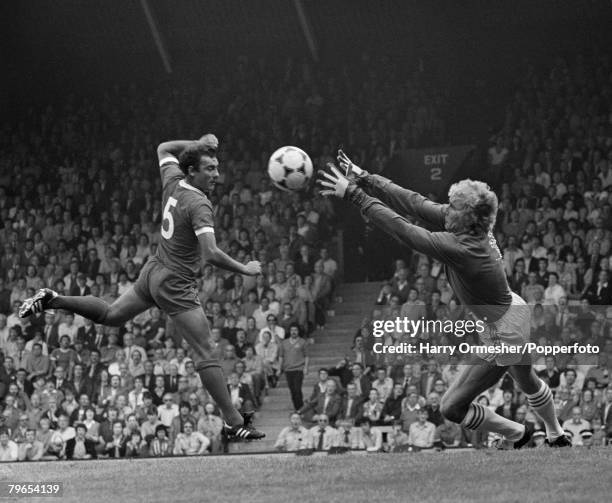 Crystal Palace goalkeeper Paul Barron claims the ball from Ray Kennedy of Liverpool during a Football League Division One match at Anfield on August...