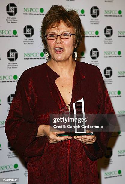 Actress Julie Walters poses with the Dilys Powell Award while attending the Awards Of The London Film Critics' Circle at the Grosvenor House Hotel,...