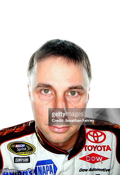 David Reutimann, driver of the UPS/Aaron's Toyota, poses for a photo during the NASCAR Sprint Cup Series media day at Daytona International Speedway...
