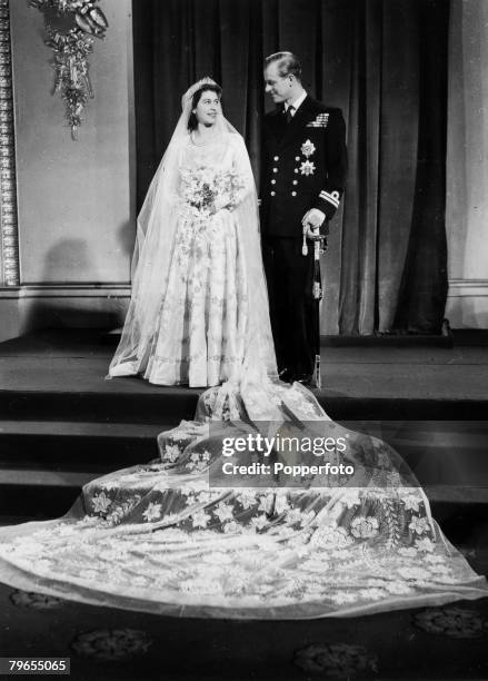 20th November 1947, Buckingham Palace, London, The wedding of Princess Elizabeth and the Duke of Edinburgh showing the couple at the Palace after...