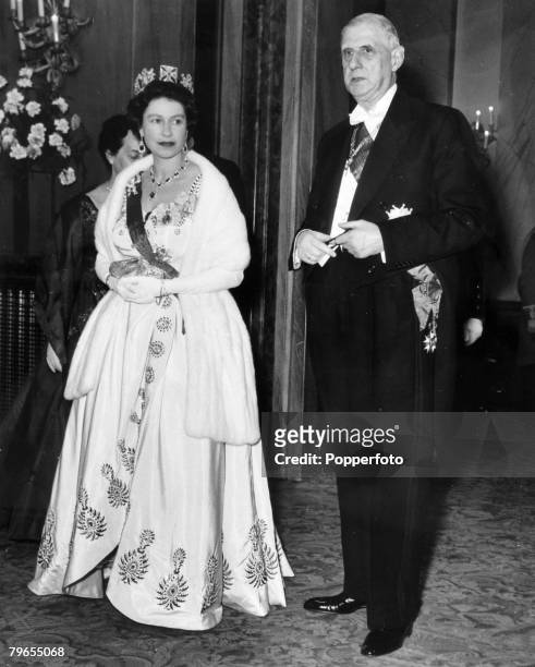 April 1960, London, HM, Queen Elizabeth with French President General Charles De Gaulle as they arrive at Covent Garden Opera House for a gala...
