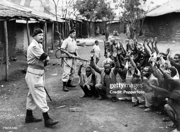 War and Conflict, Mau May Uprising, Kenya, East Africa, pic: circa 1954, Members of the Devon Regiment assisting police in searching homes at...