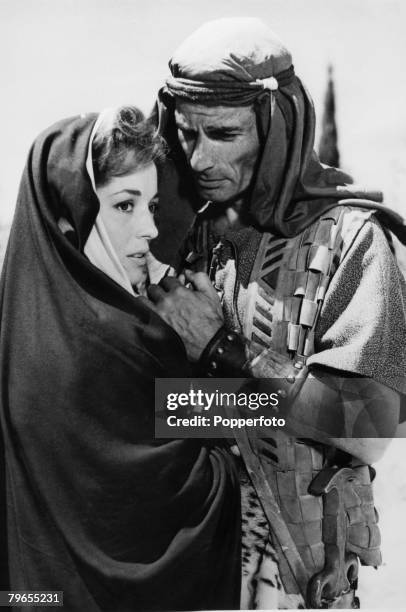 Stage and Screen, Jersulem, Israel American actor Jeff Chandler with actress Barbara Shelley from a scene from the film The Story of David