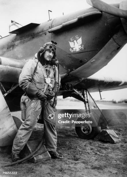 War and Conflict, World War Two, pic: 18th March 1941, Fighter pilot John Butler Ayre in flying suit, prepares to take to the cockpit of his plane,...