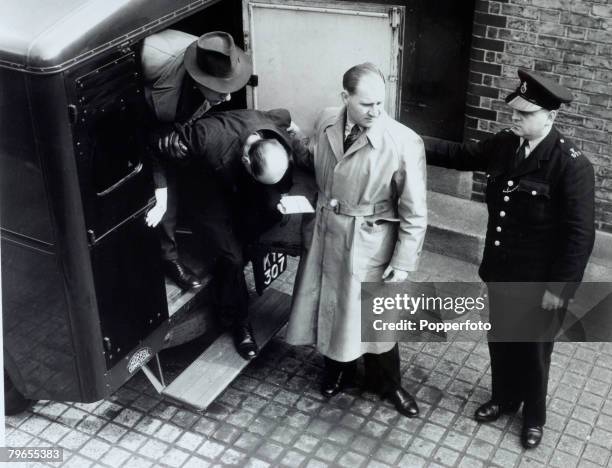 Crime, London, England The Christie Murder case, John Reginald Halliday Christie arrives with head bowed from a Police van at West London Magistrates...