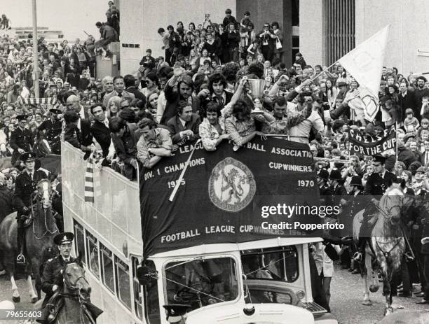 22nd May 1971, London, The triumphant Chelsea football team in an open topped bus parade the European Cup Winners Cup along the King's Road in front...