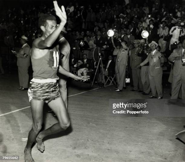 Sport, Athletics, pic: September 1960, 1960 Olympic Games in Rome, Ethiopia's barefoot runner Abebe Bikila celebrates winning the gold medal in the...