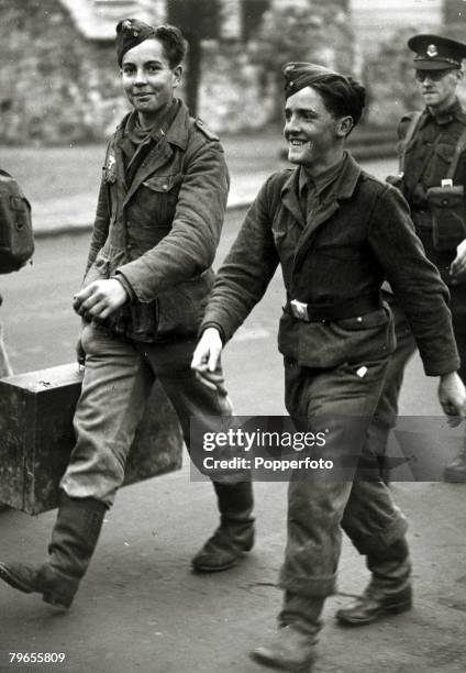 War and Conflict, World War Two, England, Captured German "young" soldiers, seem glad to be out of the war as they become prisoners of war after...