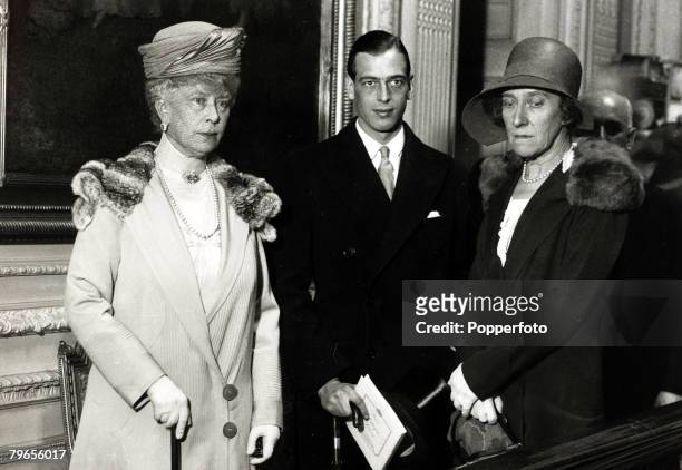 July 1929, HM,Queen Mary, left, with Prince George and Princess Marie Louise at a London silver exhibition