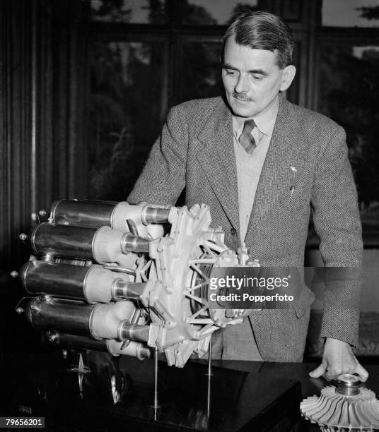 Transport, Aviation, Brownsover Hall, Rugby, England, 28th May 1948, Air Commodore Frank Whittle pictured with a model of his new invention, the jet...