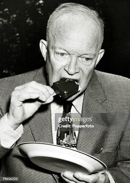 Politics, Personalities, USA, pic: August 1954, President Dwight D, Eisenhower enjoying a lollipop, Dwight D,Eisenhower became the 34th President of...