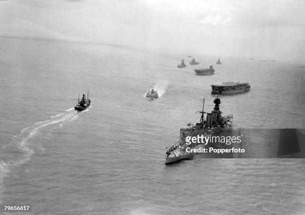 15th May 1935, Ships of the British Home Fleet pictured off Southend, H,M,S, "Rodney" is followed by the aircraft carriers H,M,S, "Courageous" and...
