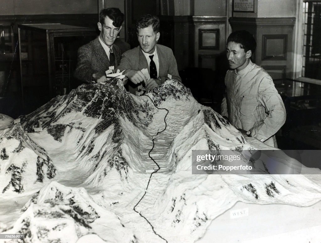 Mountaineering Personalities, pic: 1953, This picture shows Edmund Hillary, left, Colonel John Hunt and Sherpa Tenzing Norgay, right at a London press conference using a large scale model of Mount Everest showing the route the exhibition took to the summi