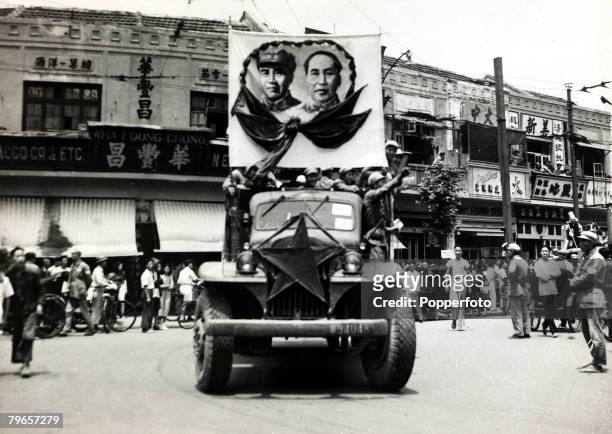 War and Conflict, Chinese Civil War, , pic: 27th June 1949, The triumphant Communist forces parade a banner portraying their leaders from a truck as...