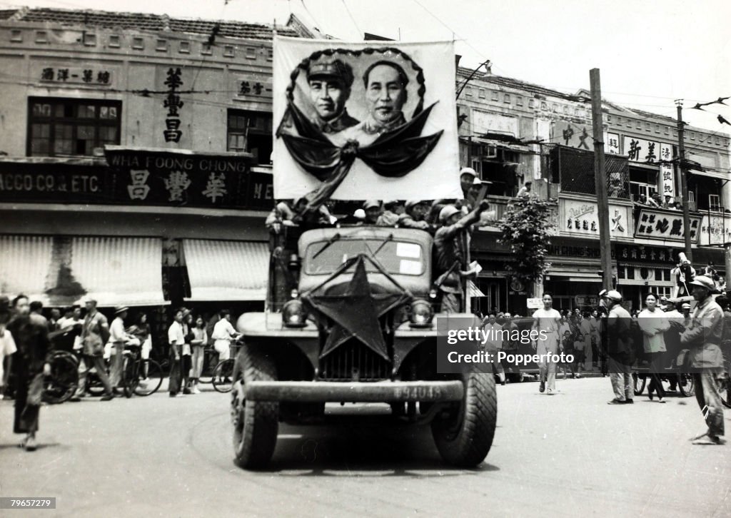 War and Conflict, Chinese Civil War, (1946-1949), pic: 27th June 1949, The triumphant Communist forces parade a banner portraying their leaders from a truck as the city of Shanghai falls to the Communist forces, The conflict between Nationalist and Commun