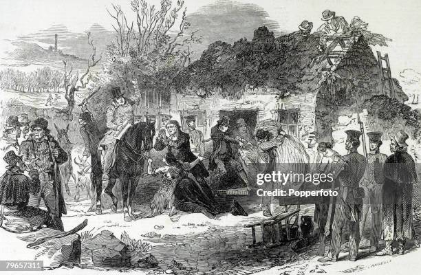Social History, Ireland An illustration showing the evictions of peasants during the winter of 1848, A landowner on horseback instructs his helpers...