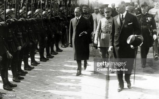 Circa 1920, HM,King George V, pictured in Paris while inspecting the French guard of honour after having placed a wreath on the tomb of the unknown...