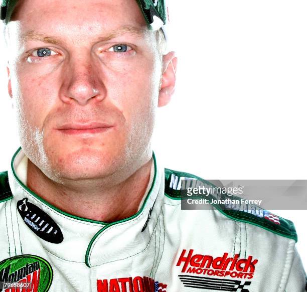 Dale Earnhardt Jr., driver of the Mountain Dew AMP/National Guard Chevrolet, poses for a photo during the NASCAR Sprint Cup Series media day at...