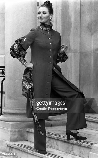 London, England, 4th November 1970, A model shows an outfit from the House of Worth collection, A short sleeved coatdress with metallic button detail...