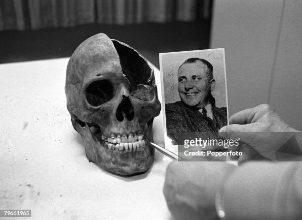 West Germany, 13th December 1972, A portrait of German Nazi politician Martin Bormann, Adolf Hitler's adviser and private secretary, is displayed...